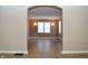 View of living room from arched doorway at 906 Raible Ave, Anderson, IN 46011