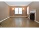 Living room with hardwood floors and fireplace at 906 Raible Ave, Anderson, IN 46011