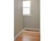Small closet with wood flooring and a window at 906 Raible Ave, Anderson, IN 46011