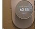 Smart thermostat, showing the temperature is set to 60.85 at 906 Raible Ave, Anderson, IN 46011