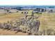 A vast land with scattered trees and greenery, as seen from an aerial viewpoint at 10194 E 900 N, Markleville, IN 46056