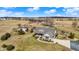 Aerial view showcases the home, large yard and detached garage with lots of open space on the property at 10194 E 900 N, Markleville, IN 46056