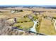 Sprawling aerial view of land, showcasing its rural location with distant buildings and fields at 10194 E 900 N, Markleville, IN 46056