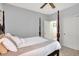 Bright bedroom with a comfortable post bed and access to a hallway at 10194 E 900 N, Markleville, IN 46056