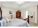 Serene bedroom with a king-size bed and built in wardrobe at 10194 E 900 N, Markleville, IN 46056