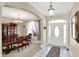 Formal dining room with a large table and hutch at 10194 E 900 N, Markleville, IN 46056