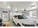 Attached garage with white car and ample space at 10194 E 900 N, Markleville, IN 46056