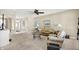 Spacious living room with a fireplace and large windows at 10194 E 900 N, Markleville, IN 46056