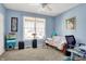 Home office with a futon, desk and large window at 10194 E 900 N, Markleville, IN 46056