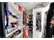 Large walk-in closet with ample shelving and hanging space at 10194 E 900 N, Markleville, IN 46056