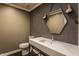 Stylish basement powder room with hexagon tile and modern vanity at 11091 Crooked Stick Ln, Carmel, IN 46032