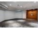 Finished basement with wood flooring and a chandelier at 11091 Crooked Stick Ln, Carmel, IN 46032