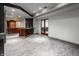 Spacious basement room with wood-look flooring and french doors at 11091 Crooked Stick Ln, Carmel, IN 46032