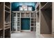 Spacious walk-in closet with ample shelving and glass-front cabinets at 11091 Crooked Stick Ln, Carmel, IN 46032