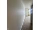 Simple hallway with neutral walls and carpet at 1330 Lake Meadow Dr, Indianapolis, IN 46217