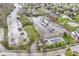 Aerial view featuring waterfront homes and marina with boat docks and community pool at 14990 E 104Th St, Fishers, IN 46040