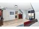 Neutral-toned bedroom featuring hardwood floors, ample space, and natural light at 14990 E 104Th St, Fishers, IN 46040