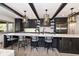Bright kitchen featuring a spacious island, modern cabinetry, stainless steel appliances, and stylish pendant lighting at 14990 E 104Th St, Fishers, IN 46040