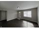 Inviting living room featuring lots of light, neutral walls, and hard surface flooring at 1612 E Raymond St, Indianapolis, IN 46203