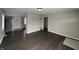 Inviting living room featuring lots of light, neutral walls, and hard surface flooring at 1612 E Raymond St, Indianapolis, IN 46203