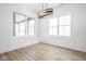 Bright dining room with hardwood floors and large windows at 17363 Newton Main St, Westfield, IN 46074