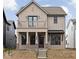 Charming two-story home featuring a balcony and covered porch, blending classic and modern design at 17363 Newton Main St, Westfield, IN 46074