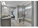 Bathroom with double vanity and shower, bedroom view at 3050 Vista View Dr, Greenwood, IN 46143
