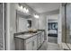 Elegant bathroom with double vanity, large mirror, and a separate shower at 3050 Vista View Dr, Greenwood, IN 46143