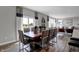 Elegant dining room with a wood table and modern chairs at 3050 Vista View Dr, Greenwood, IN 46143