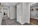 Bright hallway with linen closet and laundry room access at 3050 Vista View Dr, Greenwood, IN 46143