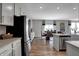 Modern kitchen boasts stainless steel appliances and light gray cabinetry at 3050 Vista View Dr, Greenwood, IN 46143