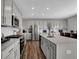 Modern kitchen with stainless steel appliances and an island at 3050 Vista View Dr, Greenwood, IN 46143