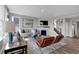 Open living room showcasing a fireplace and hardwood floors at 3050 Vista View Dr, Greenwood, IN 46143