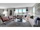 Bright living room with large windows and comfortable seating at 3050 Vista View Dr, Greenwood, IN 46143