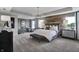 Luxurious main bedroom with sitting area and wood wall at 3050 Vista View Dr, Greenwood, IN 46143
