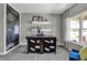 Study with chalkboard wall, built-in shelving, and comfortable seating at 3050 Vista View Dr, Greenwood, IN 46143