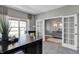 Study with french doors opening to a foyer and a desk at 3050 Vista View Dr, Greenwood, IN 46143