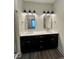 Elegant double vanity with black cabinets, white countertop, and modern lighting at 373 S Cherry St, Westfield, IN 46074