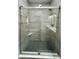 Walk-in shower with gray tiling, glass doors, and hexagon-tiled floor at 373 S Cherry St, Westfield, IN 46074