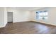 Spacious and bright finished basement with large windows and vinyl plank flooring at 7159 Rose Hill Ave, Brownsburg, IN 46112