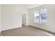 Bright bedroom with large window and access to a bathroom at 7159 Rose Hill Ave, Brownsburg, IN 46112