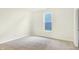 Cozy bedroom featuring a large window and neutral decor at 7159 Rose Hill Ave, Brownsburg, IN 46112