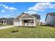 Charming craftsman style home with front porch and landscaped lawn at 7159 Rose Hill Ave, Brownsburg, IN 46112