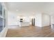 Open-concept kitchen with white cabinets, island and stainless steel appliances at 7159 Rose Hill Ave, Brownsburg, IN 46112
