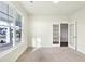 Home office with French doors and large window at 7159 Rose Hill Ave, Brownsburg, IN 46112