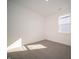 Bedroom features a window, new carpet, and fresh paint creating a blank canvas for personalization at 9236 Kavanaugh Dr, Indianapolis, IN 46239
