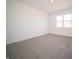 This spacious bedroom features neutral carpeting, white walls, and natural light at 9236 Kavanaugh Dr, Indianapolis, IN 46239