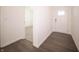 Bright entryway showcasing wood-look floors, fresh paint, and a modern front door at 9236 Kavanaugh Dr, Indianapolis, IN 46239