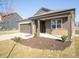 Attractive single-Gathering home featuring a covered porch, two-car garage, and well-maintained landscaping at 9236 Kavanaugh Dr, Indianapolis, IN 46239