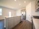 Kitchen with stainless appliances, modern cabinetry, and a kitchen island with seating at 9236 Kavanaugh Dr, Indianapolis, IN 46239